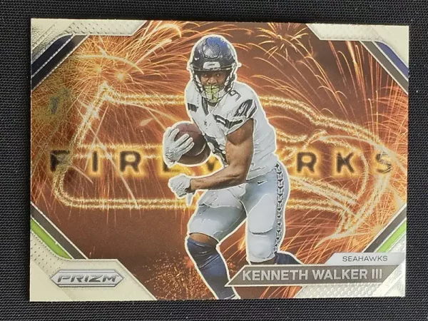 Carte à collectionner Panini Prizm Football 2023 | F-14 Kenneth Walker III | Seattle Seahawks | Insert Fireworks Prizm | Game Over Trading Cards | Site de vente en ligne de cartes à collectionner NFL & football américain. Trading cards Panini - Topps - Donruss