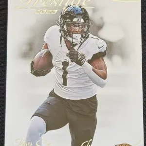 Carte à collectionner Panini Prestige Football 2023 | #139 Travis Etienne Jr. | Jacksonville Jaguars | Game Over Trading Cards | Site de vente en ligne de cartes à collectionner NFL & football américain. Trading cards Panini - Topps - Donruss