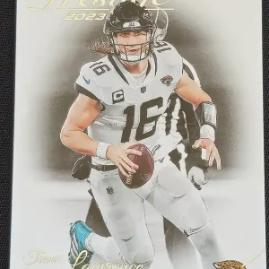 Carte à collectionner Panini Prestige Football 2023 | #140 Trevor Lawrence | Jacksonville Jaguars | Game Over Trading Cards | Site de vente en ligne de cartes à collectionner NFL & football américain. Trading cards Panini - Topps - Donruss