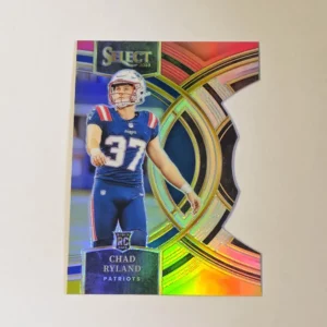 Panini Select Football 2023 | #122 Chad Ryland - New England Patriots | Premier Level Red and Yellow Prizm Die-Cut Rookie