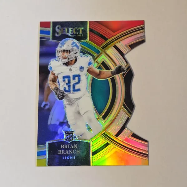 Panini Select Football 2023 | #135 Brian Branch - Detroit Lions | Premier Level Red and Yellow Prizm Die-Cut Rookie