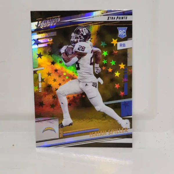 Panini Prestige Football 2022 | #318 Isaiah Spiller - Los Angeles Chargers | Xtra Points Astral Rookie Card
