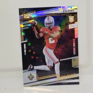 Panini Prestige Football 2022 | #310 Chris Olave - New Orleans Saints | Xtra Points Astral Rookie Card